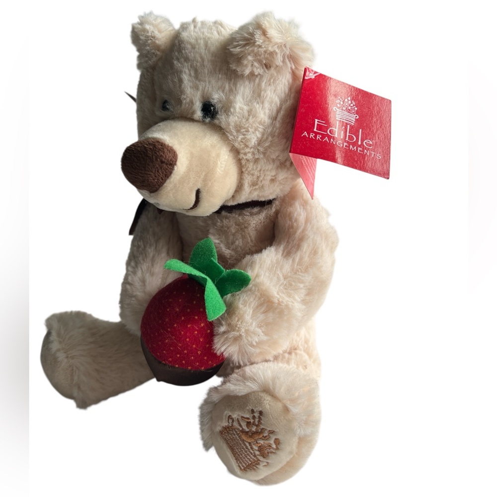 Edible Arrangements “Berry Loved Bear” cream teddy holding a strawberry
F